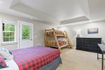 Family style bunk room features balcony access 